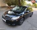 Чорний Тойота Королла, об'ємом двигуна 1.33 л та пробігом 124 тис. км за 7200 $, фото 1 на Automoto.ua