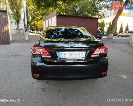 Чорний Тойота Королла, об'ємом двигуна 1.33 л та пробігом 124 тис. км за 7200 $, фото 6 на Automoto.ua