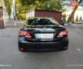 Чорний Тойота Королла, об'ємом двигуна 1.33 л та пробігом 124 тис. км за 7200 $, фото 6 на Automoto.ua