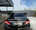 Чорний Тойота Королла, об'ємом двигуна 1.6 л та пробігом 215 тис. км за 10500 $, фото 7 на Automoto.ua