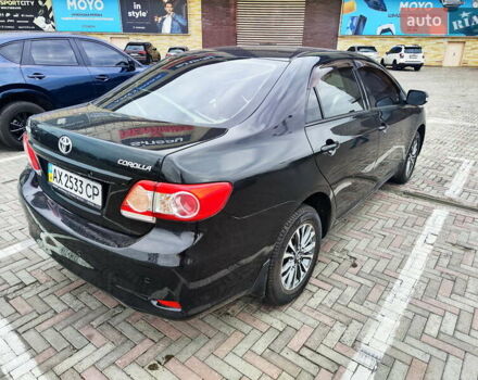 Чорний Тойота Королла, об'ємом двигуна 1.3 л та пробігом 172 тис. км за 9000 $, фото 2 на Automoto.ua