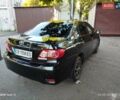 Чорний Тойота Королла, об'ємом двигуна 1.33 л та пробігом 124 тис. км за 7200 $, фото 5 на Automoto.ua