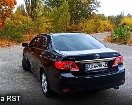 Черный Тойота Королла, объемом двигателя 1.6 л и пробегом 137 тыс. км за 9750 $, фото 2 на Automoto.ua