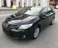 Чорний Тойота Королла, об'ємом двигуна 1.6 л та пробігом 165 тис. км за 10799 $, фото 1 на Automoto.ua