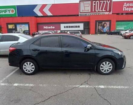 Черный Тойота Королла, объемом двигателя 1.33 л и пробегом 201 тыс. км за 8700 $, фото 4 на Automoto.ua