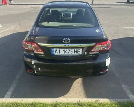 Черный Тойота Королла, объемом двигателя 1.6 л и пробегом 298 тыс. км за 9700 $, фото 2 на Automoto.ua