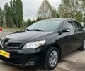 Чорний Тойота Королла, об'ємом двигуна 13 л та пробігом 223 тис. км за 7990 $, фото 1 на Automoto.ua