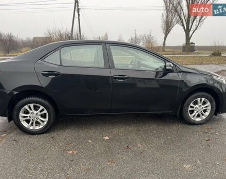 Чорний Тойота Королла, об'ємом двигуна 1.33 л та пробігом 217 тис. км за 7500 $, фото 6 на Automoto.ua