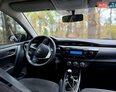 Черный Тойота Королла, объемом двигателя 1.33 л и пробегом 183 тыс. км за 9350 $, фото 5 на Automoto.ua