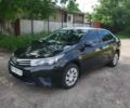 Чорний Тойота Королла, об'ємом двигуна 1.6 л та пробігом 175 тис. км за 10294 $, фото 1 на Automoto.ua