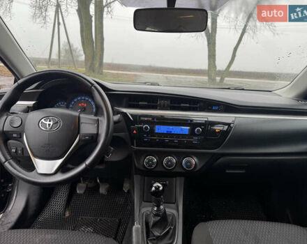 Чорний Тойота Королла, об'ємом двигуна 1.33 л та пробігом 217 тис. км за 7500 $, фото 11 на Automoto.ua