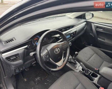 Чорний Тойота Королла, об'ємом двигуна 1.33 л та пробігом 217 тис. км за 7500 $, фото 9 на Automoto.ua