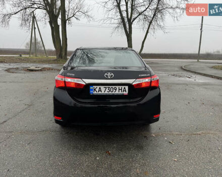 Чорний Тойота Королла, об'ємом двигуна 1.33 л та пробігом 217 тис. км за 7500 $, фото 4 на Automoto.ua