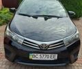 Чорний Тойота Королла, об'ємом двигуна 1.3 л та пробігом 138 тис. км за 11400 $, фото 1 на Automoto.ua