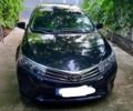 Черный Тойота Королла, объемом двигателя 1.3 л и пробегом 148 тыс. км за 9700 $, фото 1 на Automoto.ua