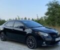 Чорний Тойота Королла, об'ємом двигуна 1.8 л та пробігом 152 тис. км за 11504 $, фото 1 на Automoto.ua