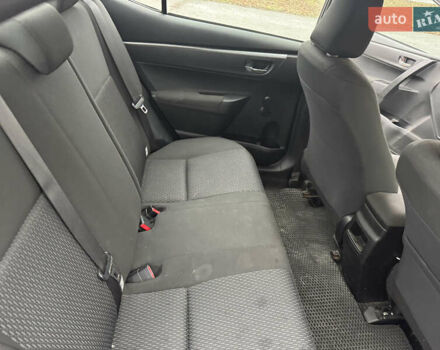 Чорний Тойота Королла, об'ємом двигуна 1.33 л та пробігом 217 тис. км за 7500 $, фото 10 на Automoto.ua