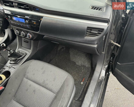 Чорний Тойота Королла, об'ємом двигуна 1.33 л та пробігом 217 тис. км за 7500 $, фото 12 на Automoto.ua