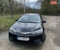 Черный Тойота Королла, объемом двигателя 1.33 л и пробегом 195 тыс. км за 9900 $, фото 1 на Automoto.ua