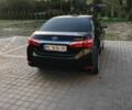 Черный Тойота Королла, объемом двигателя 1.33 л и пробегом 157 тыс. км за 11700 $, фото 1 на Automoto.ua