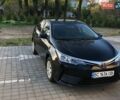 Черный Тойота Королла, объемом двигателя 1.33 л и пробегом 157 тыс. км за 12699 $, фото 1 на Automoto.ua