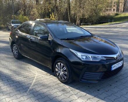 Черный Тойота Королла, объемом двигателя 1.33 л и пробегом 102 тыс. км за 12700 $, фото 2 на Automoto.ua