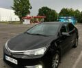 Чорний Тойота Королла, об'ємом двигуна 1.6 л та пробігом 154 тис. км за 14900 $, фото 1 на Automoto.ua
