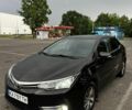 Чорний Тойота Королла, об'ємом двигуна 1.6 л та пробігом 154 тис. км за 14928 $, фото 1 на Automoto.ua