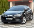 Черный Тойота Королла, объемом двигателя 1.33 л и пробегом 68 тыс. км за 11000 $, фото 1 на Automoto.ua