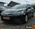 Черный Тойота Королла, объемом двигателя 1.3 л и пробегом 220 тыс. км за 8510 $, фото 1 на Automoto.ua