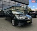 Черный Тойота Королла, объемом двигателя 1.33 л и пробегом 75 тыс. км за 15900 $, фото 1 на Automoto.ua