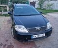Чорний Тойота Королла, об'ємом двигуна 2 л та пробігом 392 тис. км за 2800 $, фото 1 на Automoto.ua