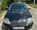Чорний Тойота Королла, об'ємом двигуна 2 л та пробігом 260 тис. км за 3750 $, фото 1 на Automoto.ua