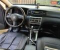 Черный Тойота Королла, объемом двигателя 1.36 л и пробегом 320 тыс. км за 5100 $, фото 10 на Automoto.ua