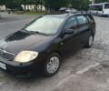 Черный Тойота Королла, объемом двигателя 1.4 л и пробегом 376 тыс. км за 4555 $, фото 1 на Automoto.ua