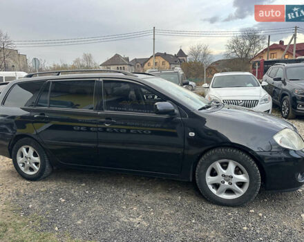 Чорний Тойота Королла, об'ємом двигуна 2 л та пробігом 330 тис. км за 5900 $, фото 3 на Automoto.ua