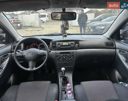 Чорний Тойота Королла, об'ємом двигуна 2 л та пробігом 330 тис. км за 5900 $, фото 10 на Automoto.ua