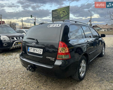 Чорний Тойота Королла, об'ємом двигуна 2 л та пробігом 330 тис. км за 5900 $, фото 4 на Automoto.ua