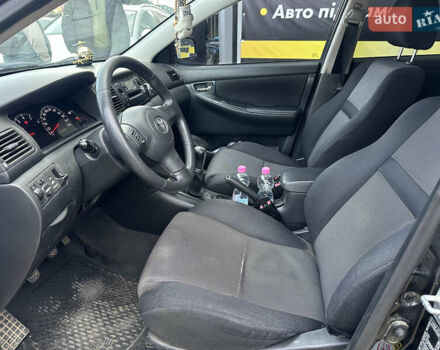 Чорний Тойота Королла, об'ємом двигуна 2 л та пробігом 330 тис. км за 5900 $, фото 8 на Automoto.ua