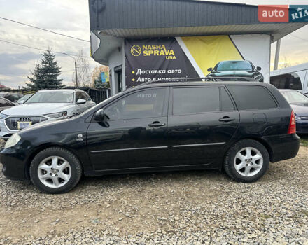 Чорний Тойота Королла, об'ємом двигуна 2 л та пробігом 330 тис. км за 5900 $, фото 7 на Automoto.ua