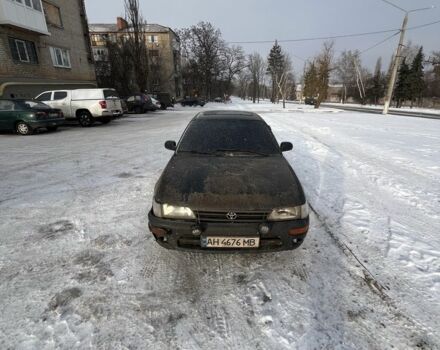 Черный Тойота Королла, объемом двигателя 1.3 л и пробегом 250 тыс. км за 1200 $, фото 1 на Automoto.ua