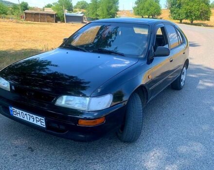 Чорний Тойота Королла, об'ємом двигуна 1.3 л та пробігом 300 тис. км за 1900 $, фото 1 на Automoto.ua