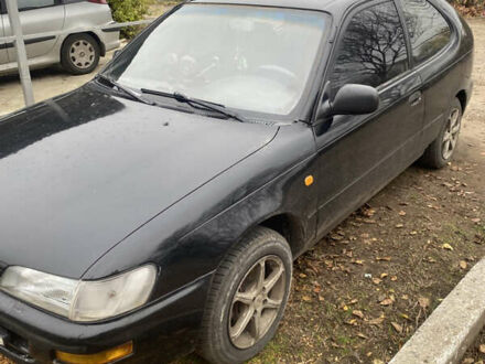 Черный Тойота Королла, объемом двигателя 1.33 л и пробегом 320 тыс. км за 2500 $, фото 1 на Automoto.ua