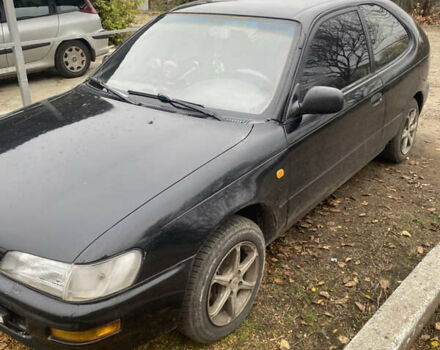 Черный Тойота Королла, объемом двигателя 1.33 л и пробегом 320 тыс. км за 2200 $, фото 1 на Automoto.ua