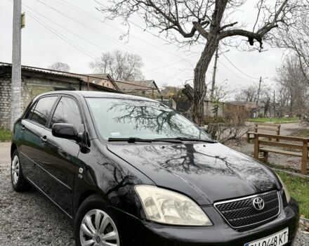 Черный Тойота Королла, объемом двигателя 2 л и пробегом 300 тыс. км за 4200 $, фото 1 на Automoto.ua