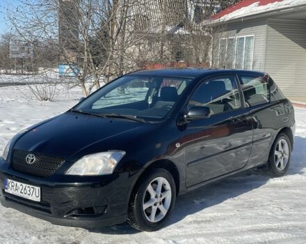 Черный Тойота Королла, объемом двигателя 2 л и пробегом 280 тыс. км за 1999 $, фото 1 на Automoto.ua