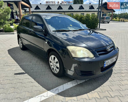Черный Тойота Королла, объемом двигателя 1.36 л и пробегом 207 тыс. км за 4950 $, фото 1 на Automoto.ua