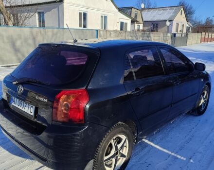 Черный Тойота Королла, объемом двигателя 1.6 л и пробегом 238 тыс. км за 5200 $, фото 1 на Automoto.ua