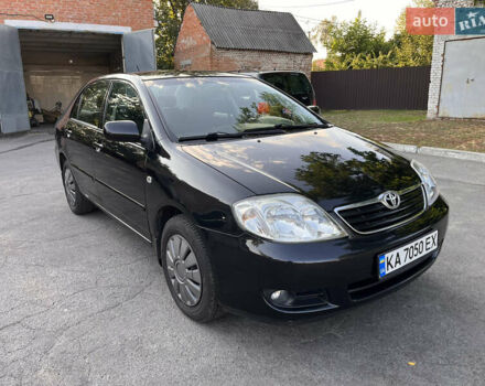 Чорний Тойота Королла, об'ємом двигуна 1.6 л та пробігом 293 тис. км за 4700 $, фото 1 на Automoto.ua