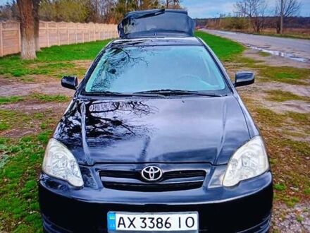 Черный Тойота Королла, объемом двигателя 1.6 л и пробегом 187 тыс. км за 5250 $, фото 1 на Automoto.ua